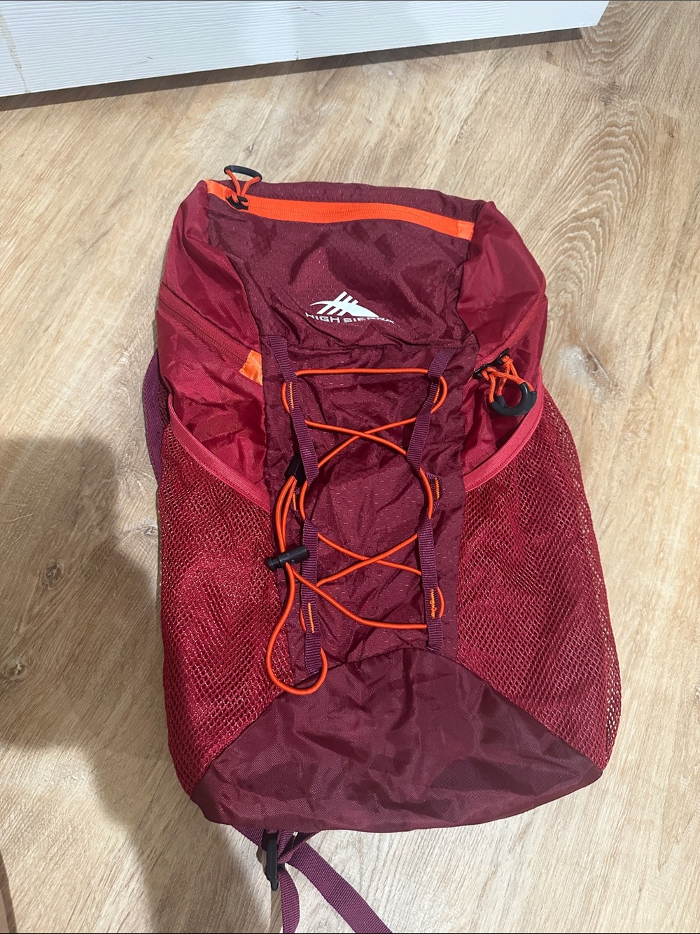 High Sierra Maroon Pack with Orange Trim 18L Pack-N-Go Sport Backpack